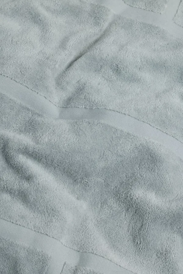Baina Badezimmertextilien^Pooltuch Woodford, 90 x 170 cm, Zement, Limited Edition