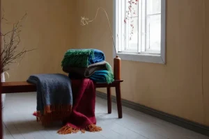 Lapuan Kankurit Decken Und Überwürfe^Revontuli Mohairdeckei, rostorange - jeansblau