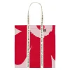 Marimekko Taschen^Carrier Midi Unikko Tasche, rot - hellrosa